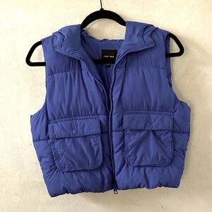 Blue puffer vest with hood and pockets size small